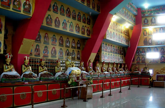 The Lineage Shrine Room in the Great Stupa at Mindrolling Monastery. Terdag Lingpa is the central figure flanked by trichens (left) and khenchens (right))
