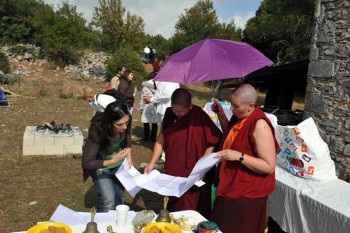 Jetsün Khandro Rinpoche reviewing architectural plans for the new Rigdzin Gatsal centre