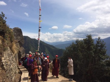 Rinpoche and group descending from Taktsang.