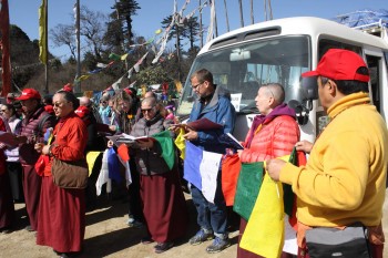 Preparing to hang prayer flags at Pelela Pass.