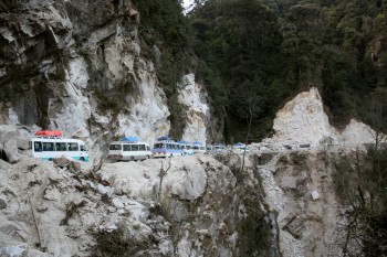 Caravan of pilgrimage vehicles.