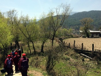 Jets&uuml;n Khandro Rinpoche leads the way from Tamshing Lhakhang to Kenchogsum Lhakhang.