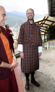 Alex Ryan surprises everyone by arriving dressed in the traditional Bhutanese men&#039;s outfit, the &lt;em&gt;gho&lt;/em&gt;.