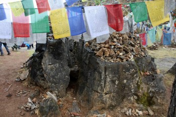 The rock removed from the cave entrance and split by Guru Rinpoche.