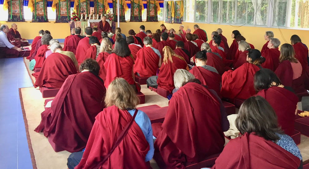 Members of the Western sangha listen to a teaching by HE Jetsün Khandro Rinpoche