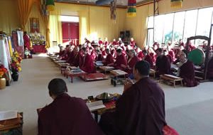 Mindrolling monks lead students during a practice